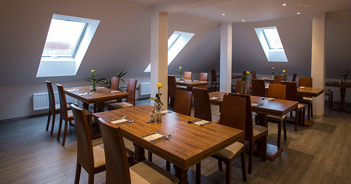 In our dining room you will find a peaceful and pleasant environment.